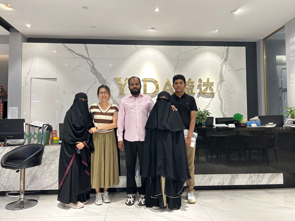 YIDA Home team with visitors at BIG 5 Dubai, showcasing premium kitchen cabinets and more