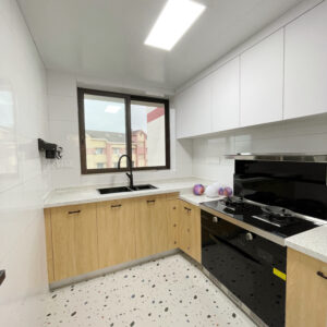 Compact and functional kitchen in a UAE apartment, featuring YIDA Home's cabinet solutions
