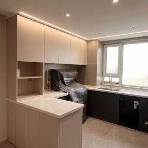 Stylish kitchen with modern cabinetry in a UAE apartment, part of YIDA Home's project portfolio