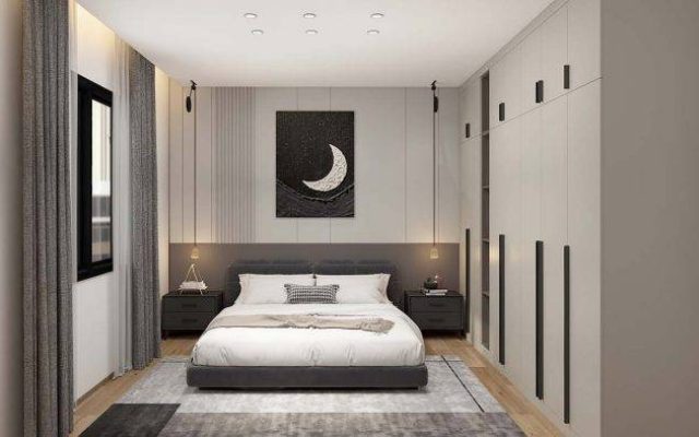 A bedroom displaying cabinets, embodying popular design trends including minimalist and clean lines, sustainable materials, and smart storage.